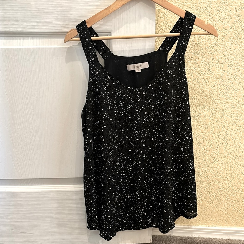 Black blouse with white star pattern, worn only a few times!
